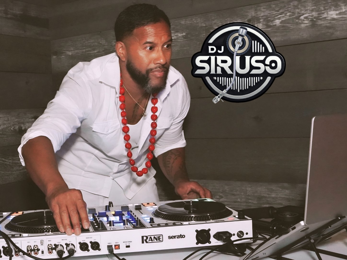DJ Sir Uso mixing on a Rane Serato controller in a white shirt and red lei, with the DJ Sir Uso logo
